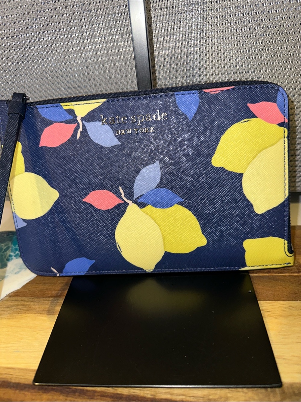 kate spade navy lemon print wristlet with multicolor leaves